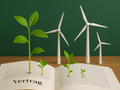 Illustration eines Gesetzestext. Aus diesem wachsen Erneuerbare Energien und Pflanzen